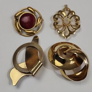 Lot of 4 vintage-style gold-tone brooches and pendants